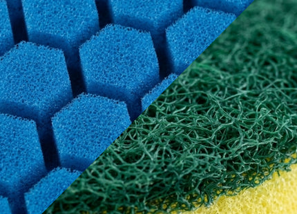 Close-up of blue, green, and yellow sponges with textured surfaces.